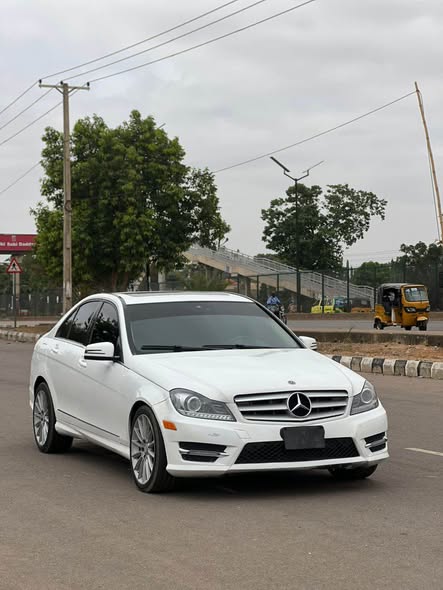 A picture of EXTREMELY CLEAN USED MERCEDES BENZ C300 MODEL 2013
