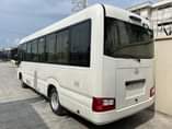A picture of Brand New Toyota Coater Bus 2022 White location Amuwo Odofin