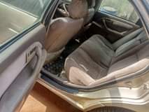 A picture of PARTIALLY FIRST BODY NIGERIA USED TOYOTA CAMRY good engine good