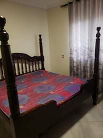 A picture of 6 6 bed and matress and sofa chair