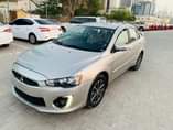 A picture of Mitsubishi Lancer 2016 mid option for sale bank auto loan