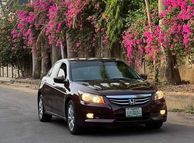 A picture of USED HONDA ACCORD WINE 2009 MODEL WITH SUNROOF AT KADUNA