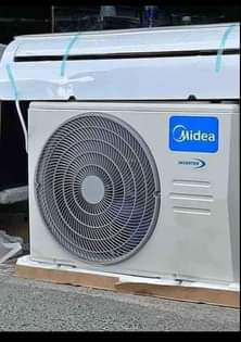 A picture of AIR CONDITIONER COMPANY YA MIDEIA NON INVETER NA INVETER ZIPO