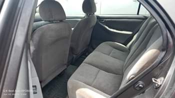 A picture of Toyota Corolla CE 2004 toks standard brought in 2018 Everything