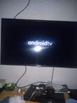 A picture of Hisense 32 smart tv with remote