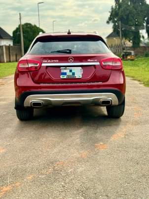 A picture of 2016 registered Mercedes Benz GLA250 pepper red on black