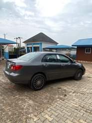 A picture of Toyota Corolla 2006 Engine and gear perfect AC is chilling