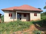 A picture of 2 bedroom and sitting room with store at lukwanga town