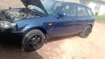 A picture of MAZDA 323f TOMORROW DEAL FOR SALE MANUAL GEAR ENGINE GOOD