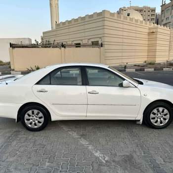 A picture of Toyota Camry Model 2004 Gcc km 210k engine gear CC