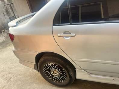A picture of Belgium grade 2004 model toyota corolla With sound engine Smooth