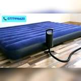 A picture of Air mattresses and sleeping bags