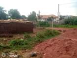 A picture of 32 decimals for sale in Kisaasi Komamboga ready title asking
