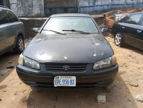 A picture of This car is Toyota Camry aka tiny light Engine sharp