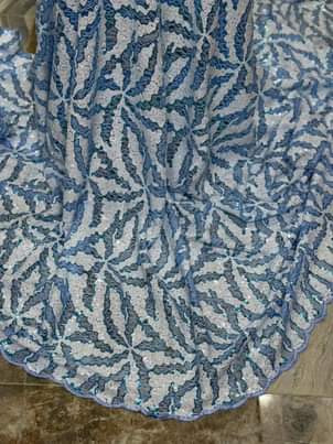 A picture of WEDDING GOWN MATERIAL FOR EXPENSIVE BRIDES AT AFFORDABLE PRICE Message