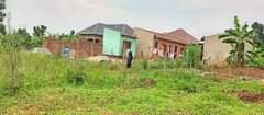 A picture of MATUGGA KIWEEBWA MANZE SITE 256705309448 Plot size 20by25ft 1m Plot