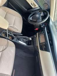 A picture of 2015 Corolla LE is Neatly flashed on First body with