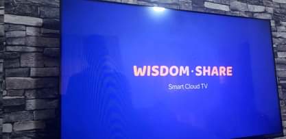 A picture of 49inch smart Tv L sofas