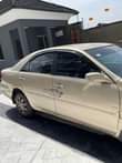 A picture of Toyota camry 2004 engine and gear working very perfect never