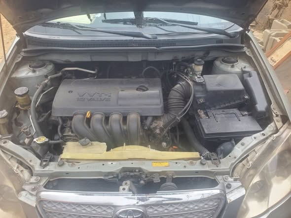 A picture of 2004 Toyota Corolla engine gear ac perfect first body price