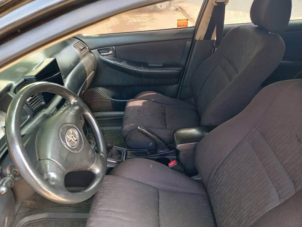 A picture of Distress 2004 manual drive Corolla with android screen buy nd