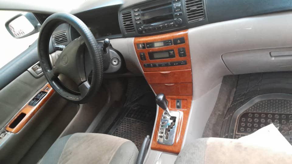 A picture of W Toyota Corolla 2004 Model. Engine dey smoke but Gearbox