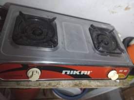 A picture of Jiko plate mbili na mtungi mkubwa wa ORYX empty vyote
