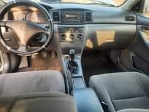 A picture of Sharp 2004 Toyota manual bank Corollasound four plugs engine good