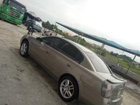 A picture of Neatly used Nissan Altima 2006 model pure first body Tokunbo