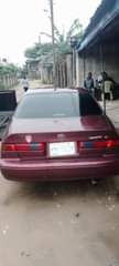 A picture of 2000 model Toyota camry tiny light engine and gear first