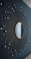 A picture of wall mirror decorations at cheaper prices