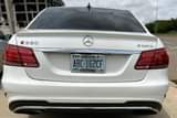 A picture of Belgium Standard 2011 Mercedes Benz E350 4MATIC white 1st body