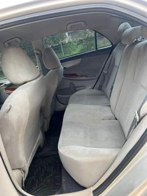 A picture of 8m with sambo 2013 Toyota Corolla on belt with untampered