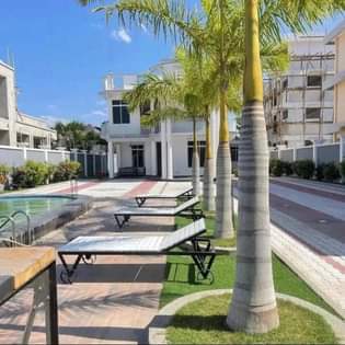 A picture of NYUMBA NZURI YA KIFAHARI GOROFA LINAUZWA MBWENI BEI B.12 NIPIGIE