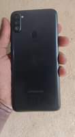 A picture of Cracked Samsung galaxy A11 in good working condition It s