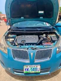 A picture of FIRST BODY UNTEMPERED COROLLA ENGINE DISTRESS USED PONTIAC VIBE 2009