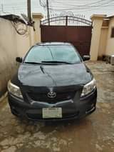 A picture of Toyota Corolla 08 painted engine gear AC perfect ok price