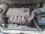 A picture of Toyota Corolla 2004 bank type
