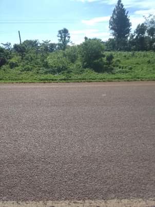 A picture of 100 by 100 ft on Mukono katosi road Tarmac road