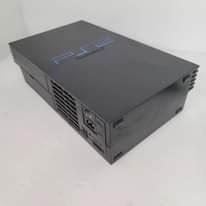 A picture of playstation 2 with 2 controllers and cables plus 10 games