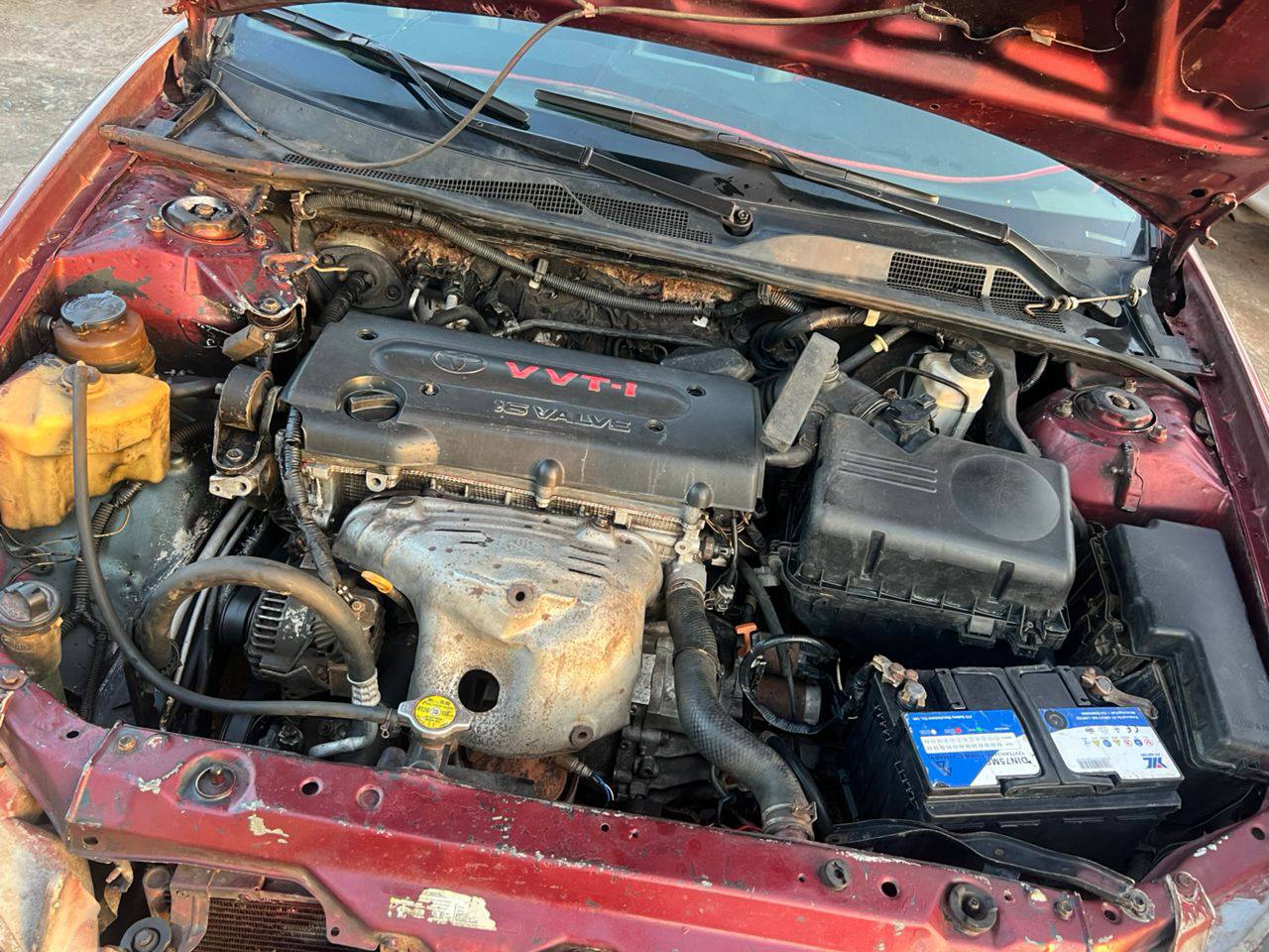 A picture of Registered Camry 04 upgraded to 06 in fair condition.