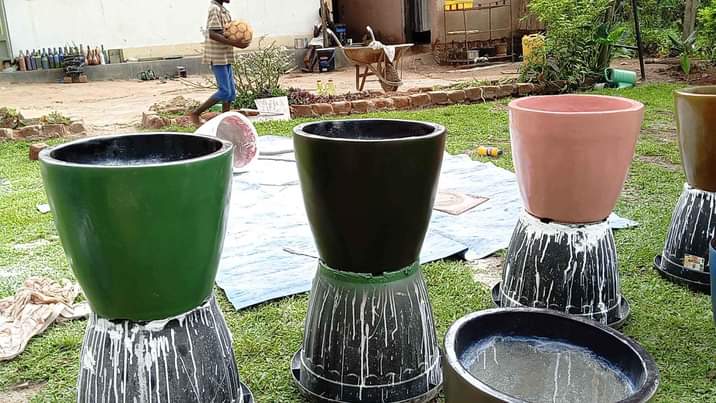 A picture of V shaped orchid xl ceramic finish cement pots