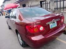 A picture of 05 Toyota Corolla with Android and Reverse Camera 2 6m