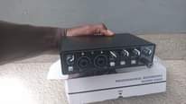 A picture of Studio microphone and sound card