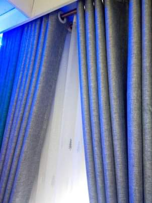 A picture of Curtains and rods