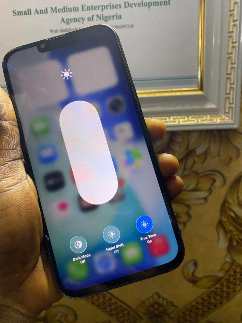 A picture of Very clean and perfect iPhone 13promax no Face ID 128gig