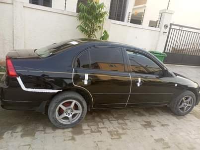 A picture of Honda Civic 03 very clean and sharp nothing to fix