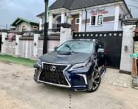 A picture of Rx350 2011 F ports Đirect Ťoks Upgraded to 2020 Ćustom