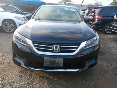 A picture of Clean toks 014 Honda accord key 4 plug engine leather