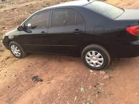 A picture of Toyota Corolla 2003 do car is 1st body engine and